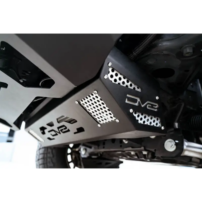 Front fender of motorcycle with black and white number plate and DV8 Offroad 21-22 Ford Bronco Front Skid Plate.