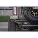 Close-up of DV8 Offroad 21-22 Ford Bronco FS-15 Series Rear Bumper featuring 5mm steel construction and installation instructions.