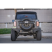 Close-up of Jeep parked on street near building, DV8 Offroad 21-22 Ford Bronco FS-15 Series rear bumper.