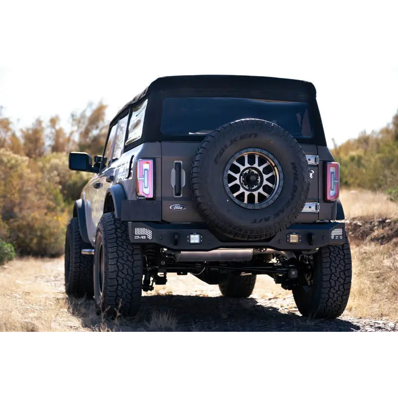 Black Jeep with MTO Series rear bumper and tire cover.