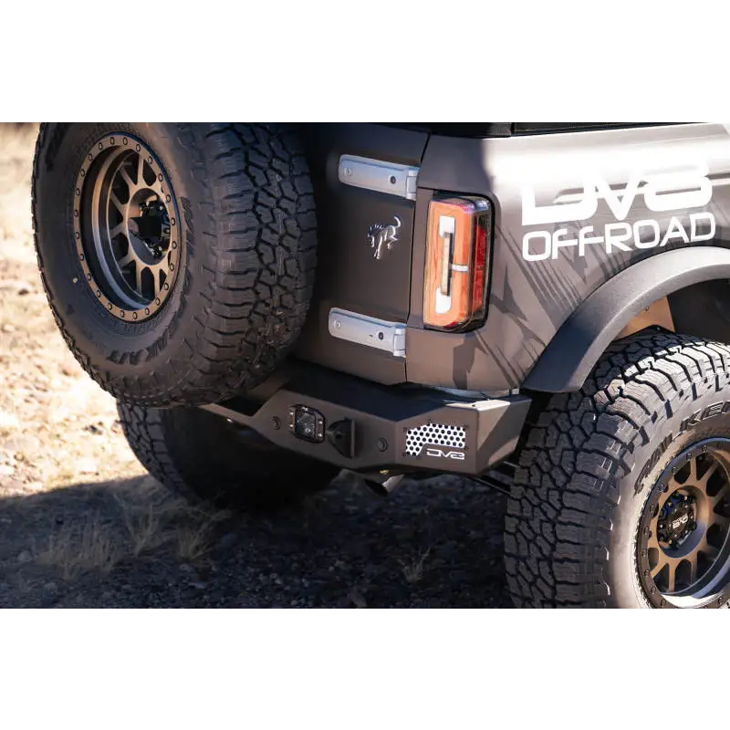 Close up of truck with large tire on DV8 Offroad 21-22 Ford Bronco MTO Series Rear Bumper