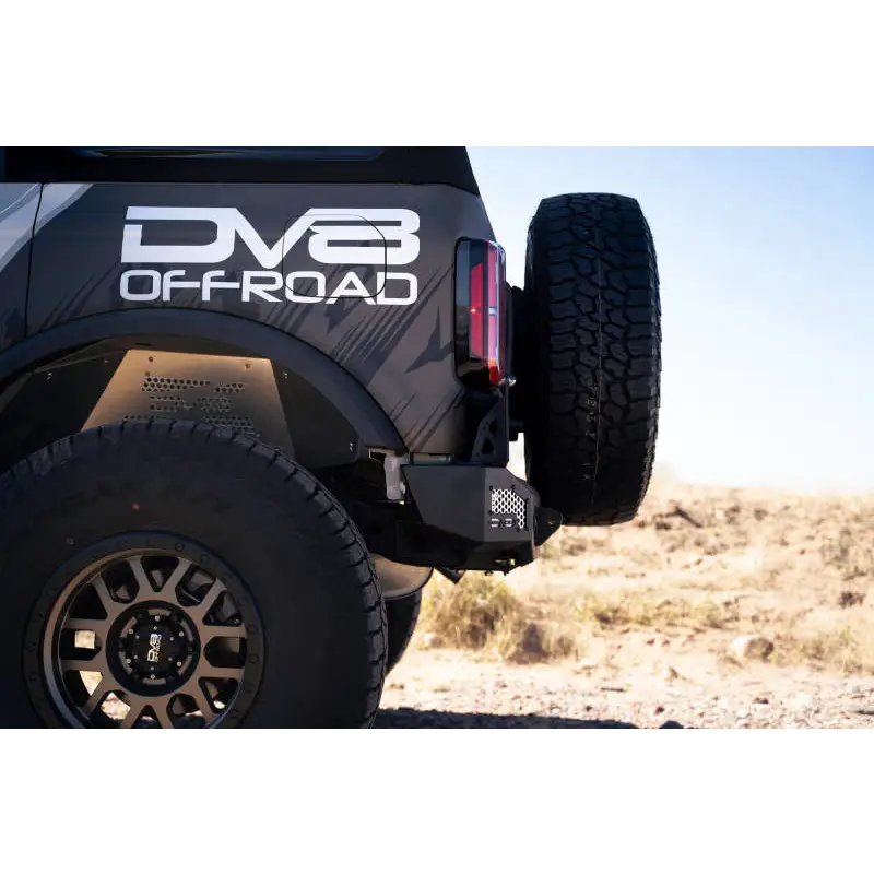 DV8 Offroad MTO Series Rear Bumper with Black Jeep displaying logo and license plate