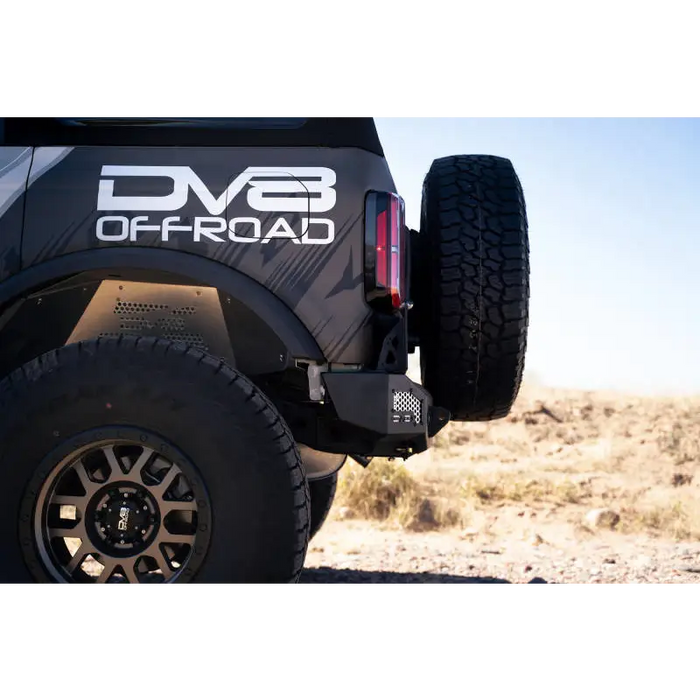 DV8 Offroad MTO Series Rear Bumper with Black Jeep displaying logo and license plate