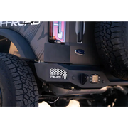 Close up view of truck with tire cover, featured in DV8 Offroad 21-22 Ford Bronco MTO Series Rear Bumper.