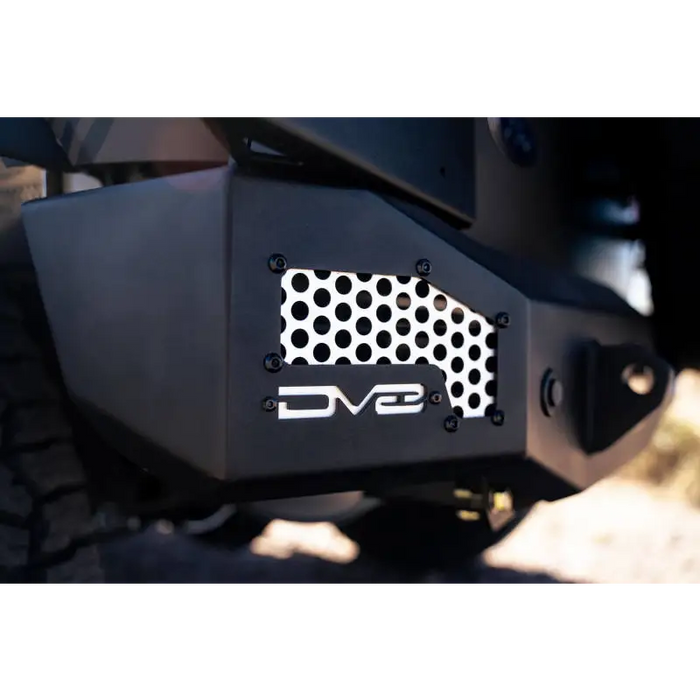 Close-up of DV8 Offroad 21-22 Ford Bronco MTO Series rear bumper license plate logo.