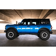 Blue lifted truck with big tire - DV8 Offroad Ford Bronco OE Plus Side Steps