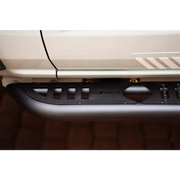 Close up of Ford Bronco with bumper, DV8 Offroad Side Steps.