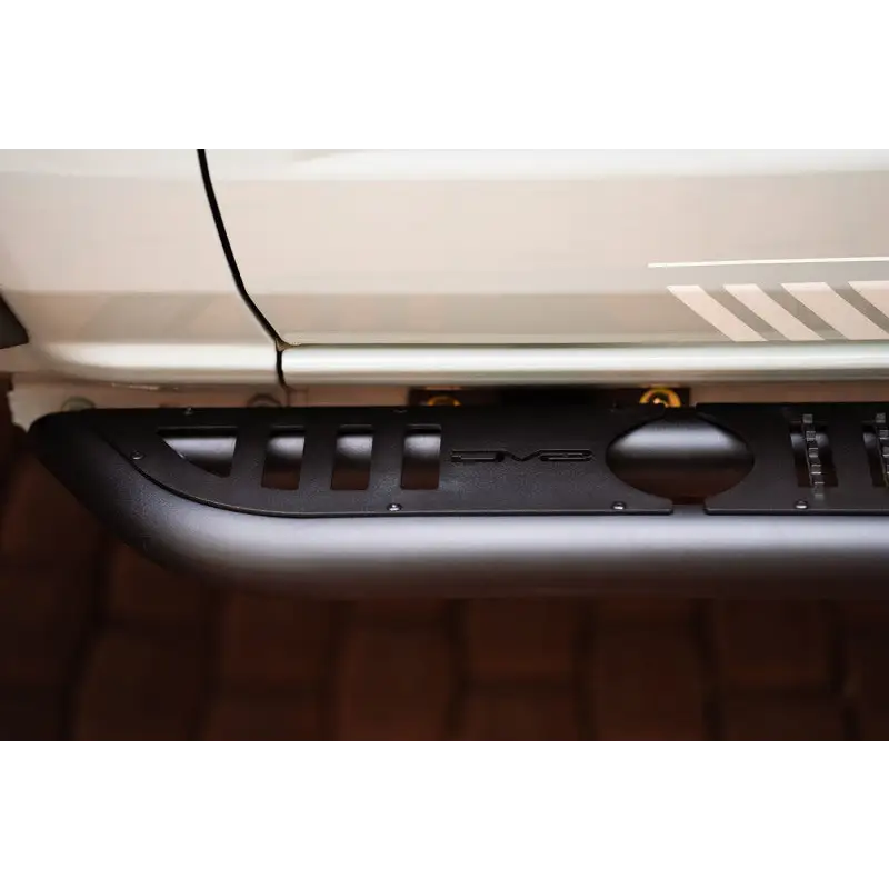 Close up of Ford Bronco with bumper, DV8 Offroad Side Steps.