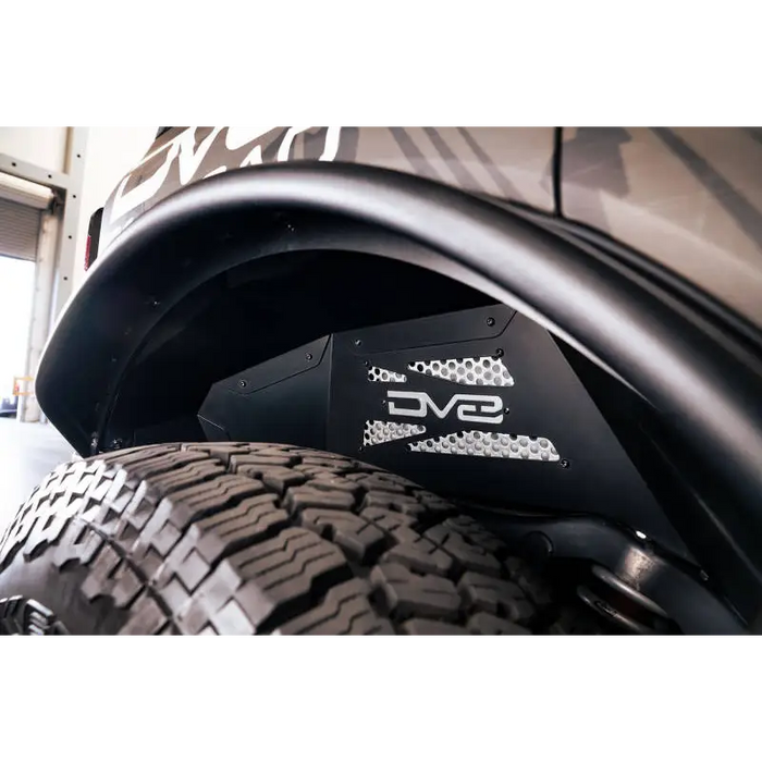 DV8 Offroad lightweight aluminum Ford Bronco rear inner fender liners with logo on front bumper.