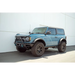 Blue Truck parked in front of a building - DV8 Offroad Pinch Weld Covers for Ford Bronco