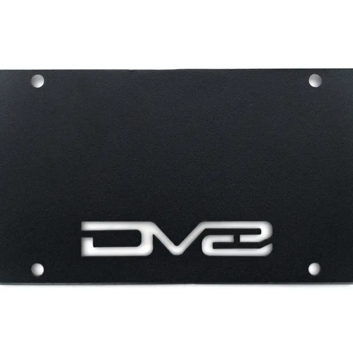 Black license plate with logo of DG on DV8 Offroad 21-23 Ford Bronco Capable Bumper Front License Plate Mount