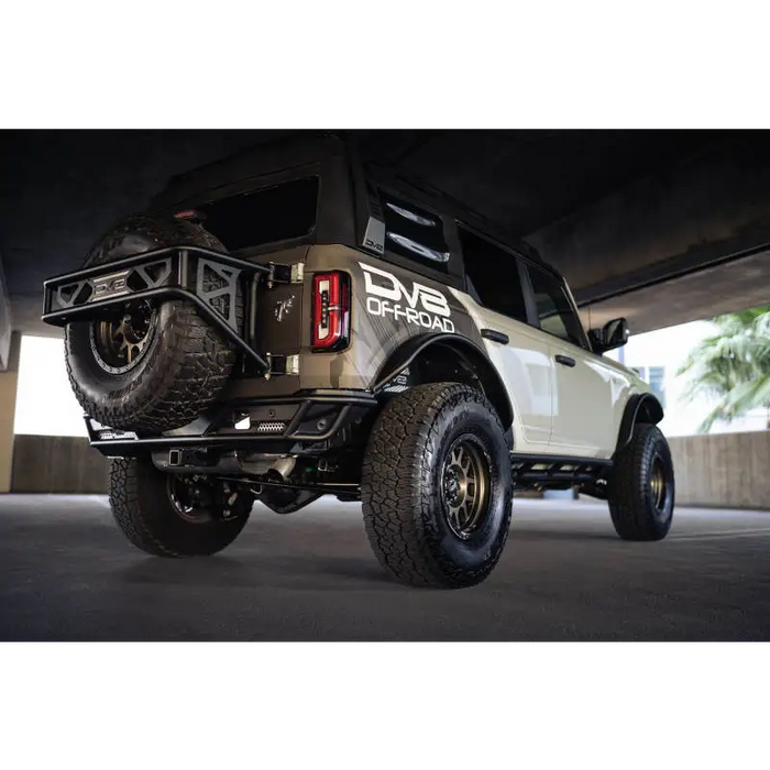 White truck parked under a bridge, DV8 Offroad Bronco Competition Series Rear Bumper