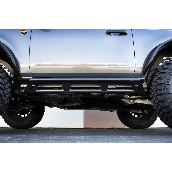 Silver truck front bumper close up - DV8 Offroad Ford Bronco Rock Sliders