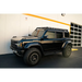 Black truck parked with DV8 Offroad Ford Bronco Hard Top Roof Rack