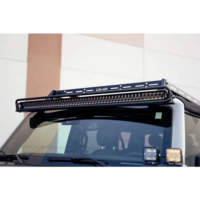 Black roof rack with light bar on top for DV8 Offroad 21-23 Ford Bronco Soft Top Roof Rack.