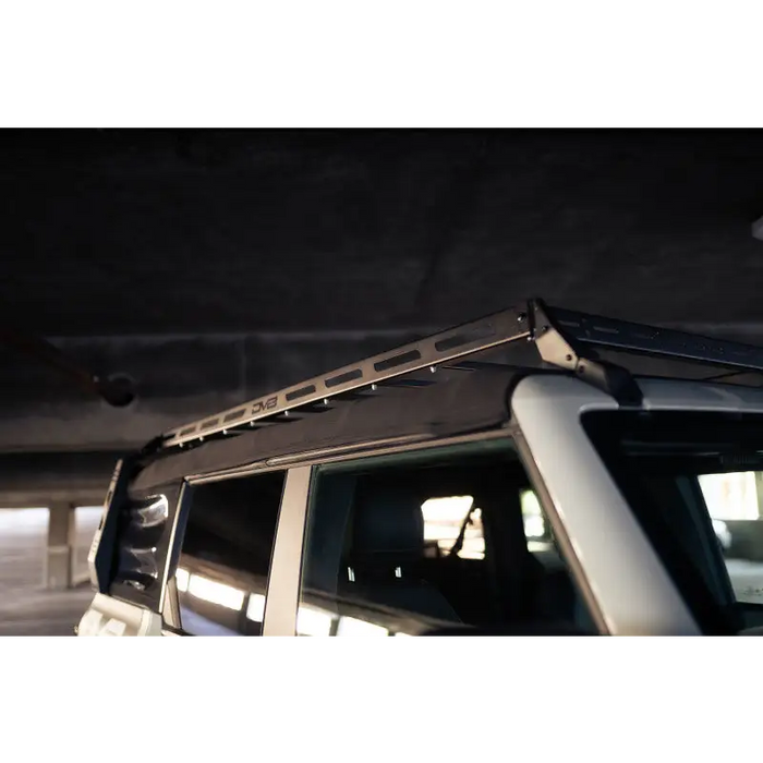 DV8 Offroad 21-23 Ford Bronco Soft Top Roof Rack with Roof Rack at Parking Garage