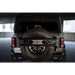 DV8 Offroad Ford Bronco spare tire guard with large tire.