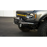 DV8 Offroad silver truck front bumper bar with skid plate and light bar, Spec Series.