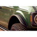Green truck with black bumper and tire - DV8 Offroad Ford Bronco fender flares
