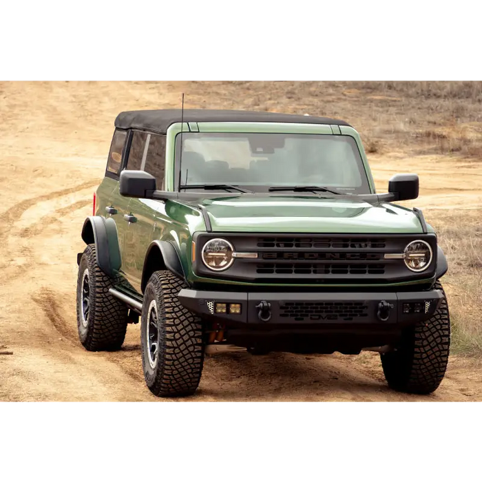 Green lifted truck with DV8 Offroad 21-23 Ford Bronco Tube Fender Flares.