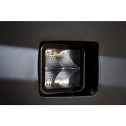DV8 Offroad 3in Cube Elite Series Lights - close up of pod light on wall