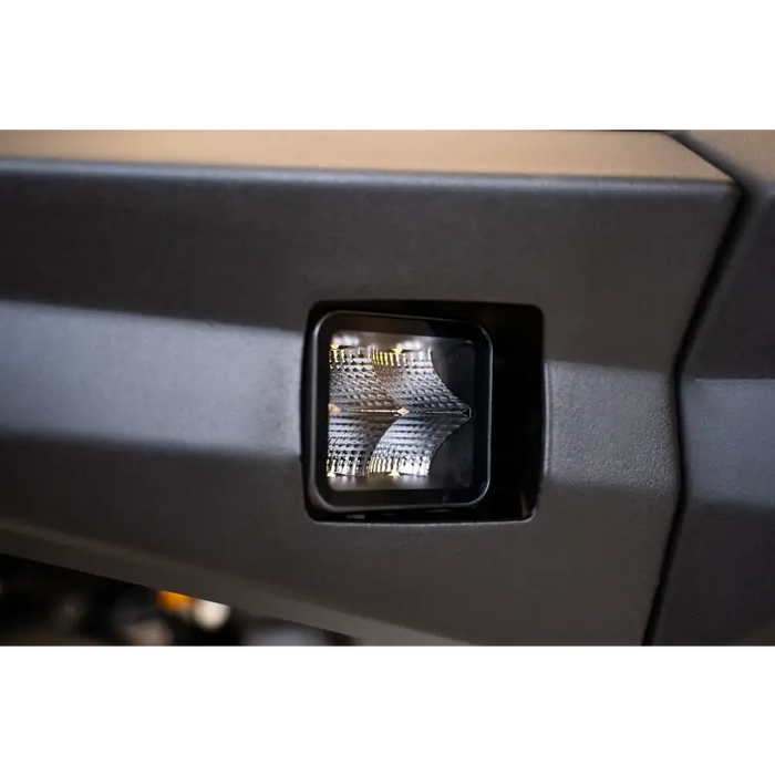 Close-up of LED front lights on DV8 Offroad Elite Series cube light pod.