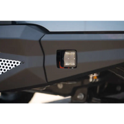 Close up of DV8 Offroad Elite Series 3in Cube LED Light with front light on motorcycle
