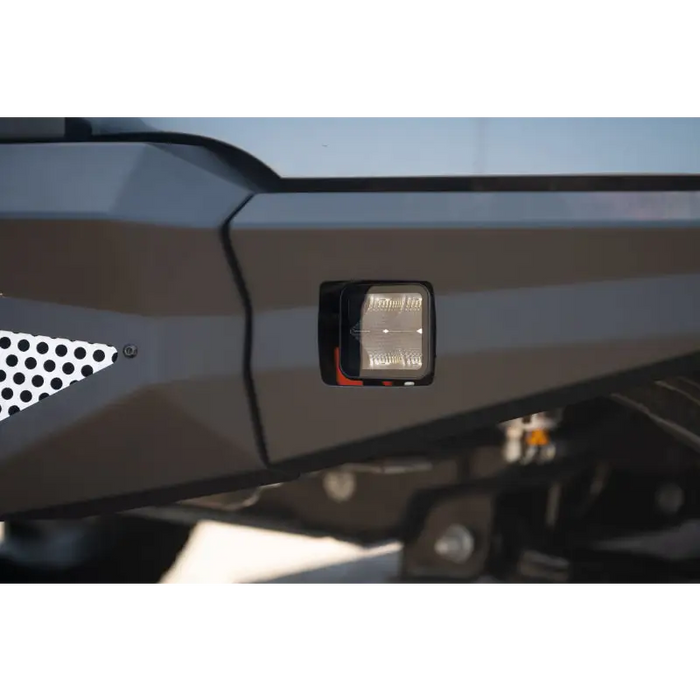 Close up of DV8 Offroad Elite Series 3in Cube LED Light with front light on motorcycle