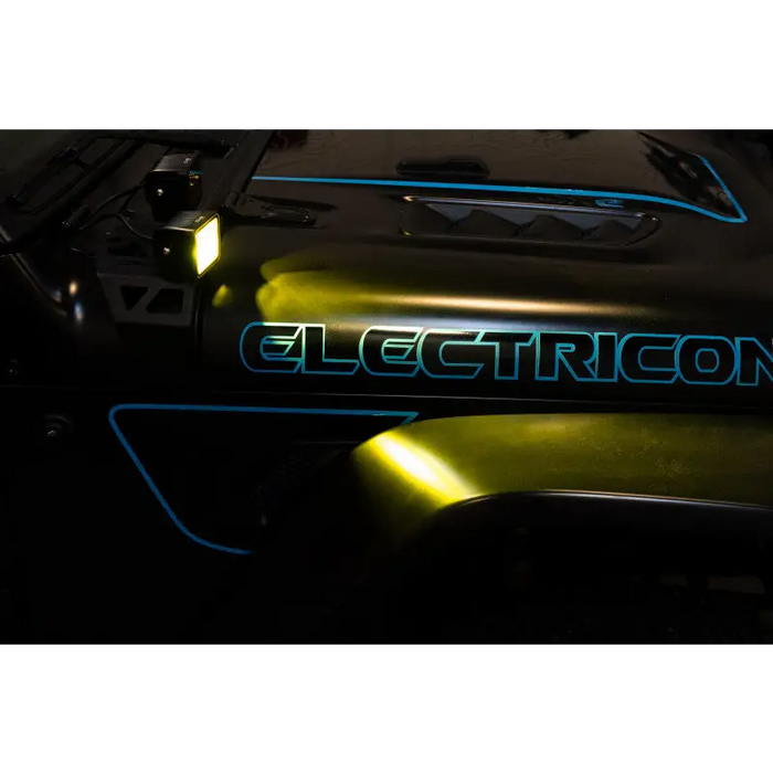 Electric car with ’DV8 Offroad 3in Elite Series LED Amber Pod Light’ displayed.