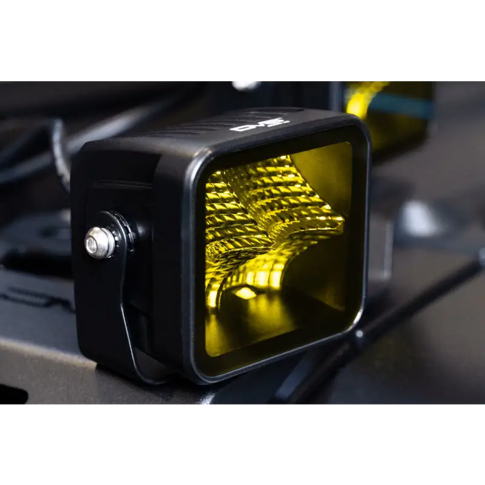 DV8 Offroad 3in Elite Series LED Amber Pod Light on black camera