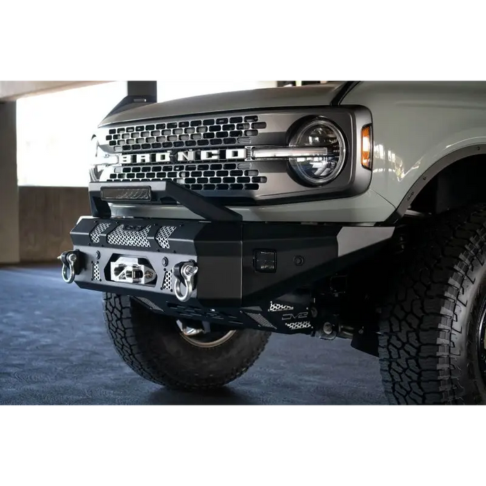 Close up of grey 2020 Ford Bronco Raptor front bumper bar with DV8 Offroad Elite Series Light Bar add-on