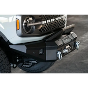 White truck with black bumper compatible with DV8 Offroad Bull Bar Add-On for DV8 Ford Bronco Bumpers - Fits 13in Elite Series Light Bar