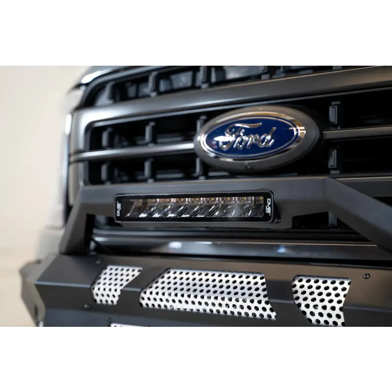 Ford logo displayed on the front of a DV8 Offroad Elite Series 13in Light Bar 45W Flood/Spot LED vehicle