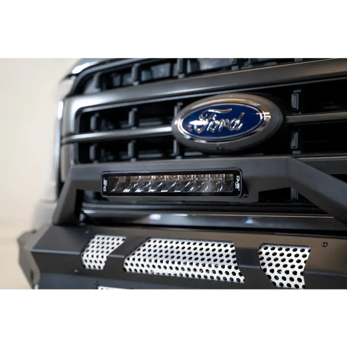 Ford logo displayed on the front of a DV8 Offroad Elite Series 13in Light Bar 45W Flood/Spot LED vehicle