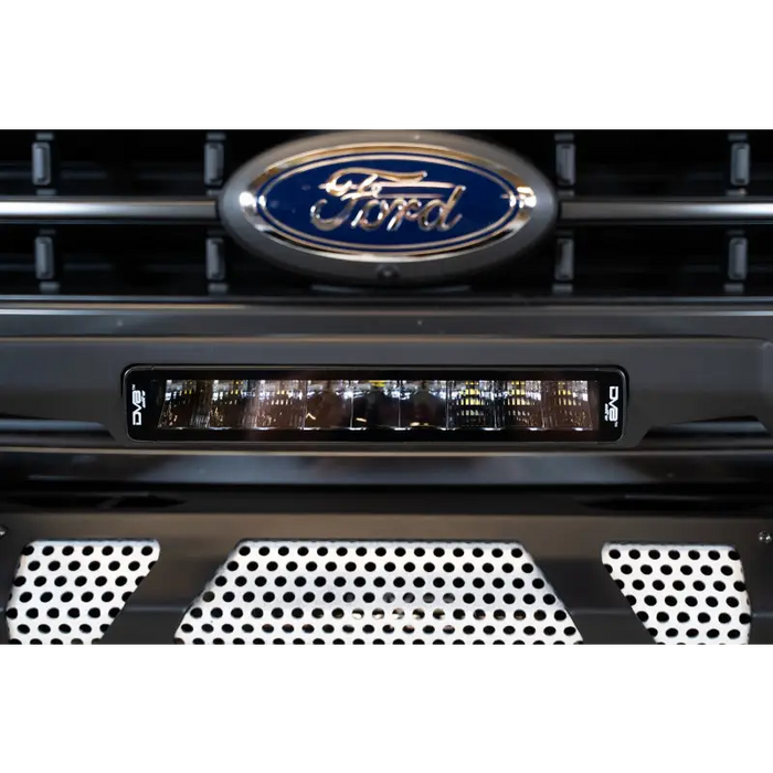 Close-up of grille with Ford logo on DV8 Offroad Elite Series 13in Light Bar 45W Flood/Spot LED.