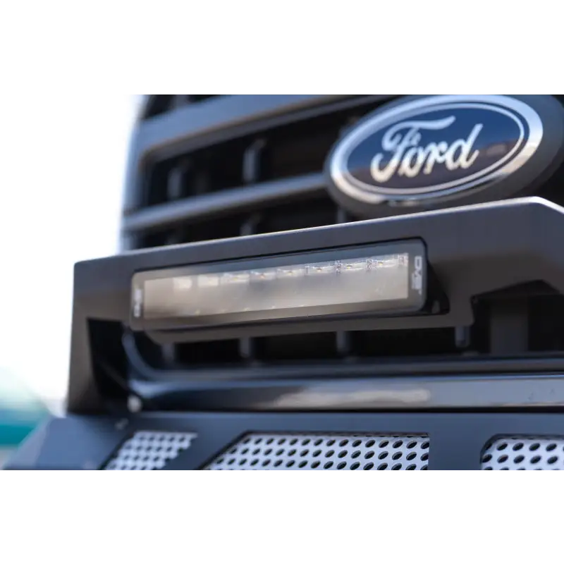 Close up of Ford logo on truck grille on DV8 Offroad Elite Series lights