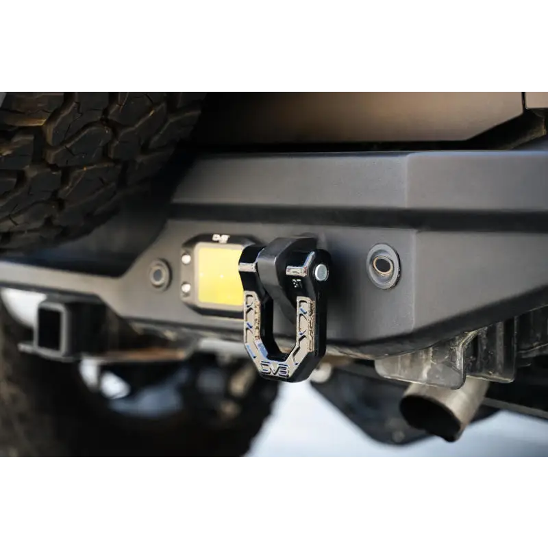 DV8 Offroad Elite Series D-Ring Shackles - Pair (Black) rear bumper mount close up.