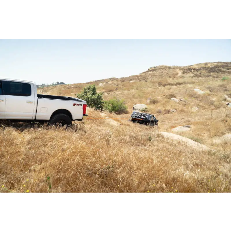 White truck parked in grass near DV8 Offroad Elite Series D-Ring Shackles (Black)