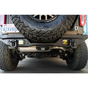 Black DV8 Offroad Elite Series D-Ring Shackles parked in a garage
