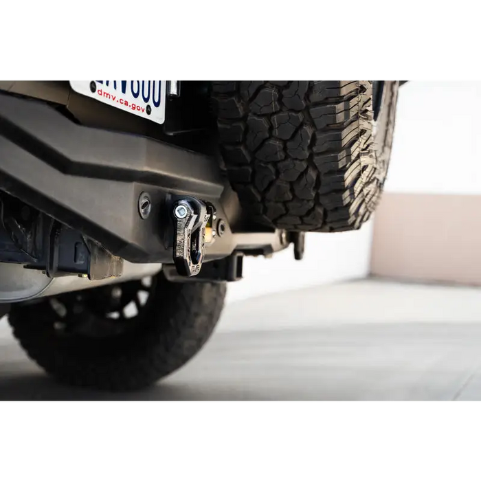 DV8 Offroad Elite Series D-Ring Shackles - Pair (Black) rear bumper plate close up.