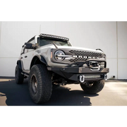 White truck parked in front of building - DV8 Offroad Elite Series D-Ring Shackles - Pair (Gray)