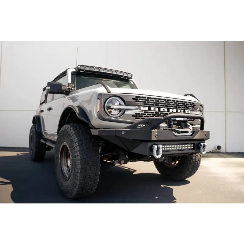 White truck parked in front of building - DV8 Offroad Elite Series D-Ring Shackles - Pair (Gray)