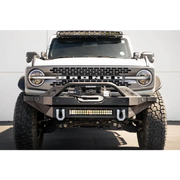 White Jeep with light bar featuring DV8 Offroad Elite Series D-Ring Shackles - Pair in Gray color.