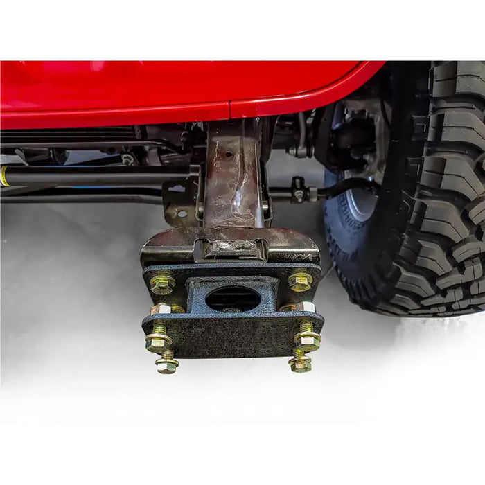 Red ATV with black front and rear bumper from DV8 Offroad Jeep JK to Jeep JL Front Bumper Adapter Bracket