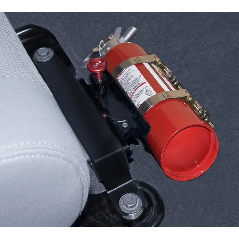 DV8 Offroad Quick Release Fire Extinguisher Mount for Jeep Wrangler on black surface