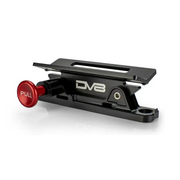 Red quick release fire extinguisher mount button on black device - DV8 Offroad Jeep Wrangler product.