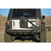Black Jeep with License Plate on Bumper Mounted Tire Carrier DV8 Offroad RS-10/RS-11 TC-6