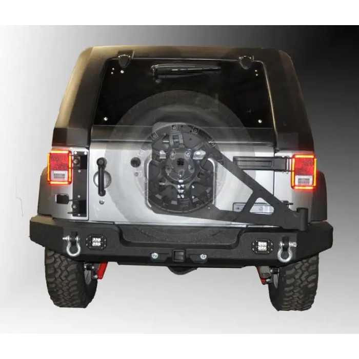 DV8 Offroad RS-10/RS-11 TC-6 Tire Carrier with bumper mounted tire rack.