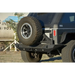 Offroad Jeep with DV8 Offroad RS-10/RS-11 TC-6 Bumper Mounted Tire Carrier