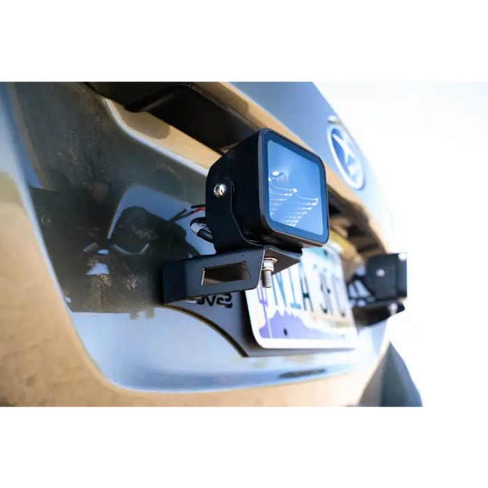 Universal license plate mount with GPS device on car